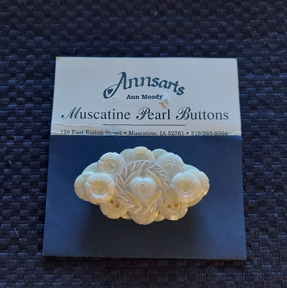 Muscatine Pearl buttons pin